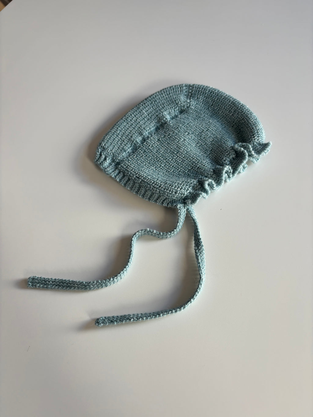 Capota de lana turquesa