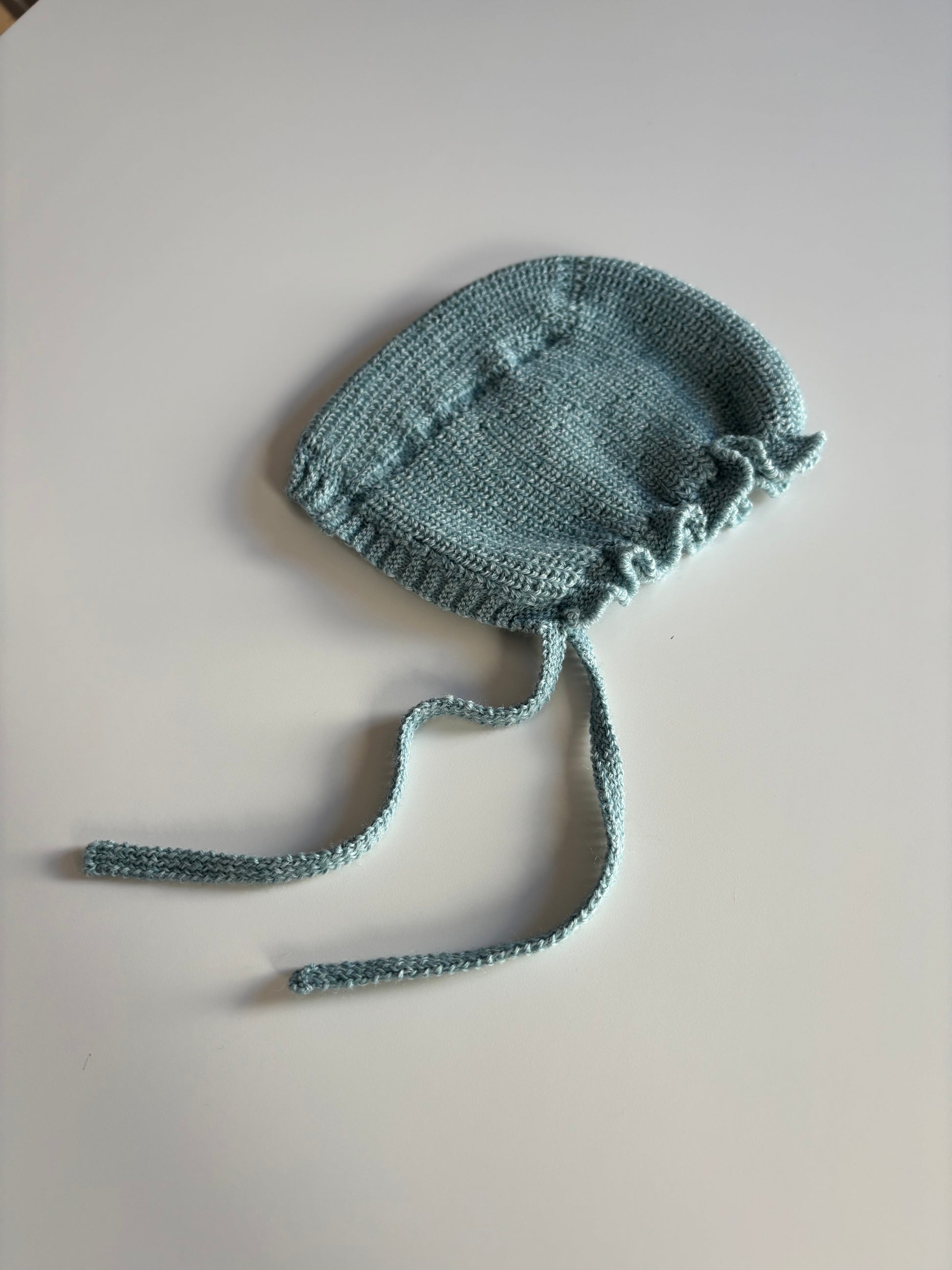 Capota de lana turquesa