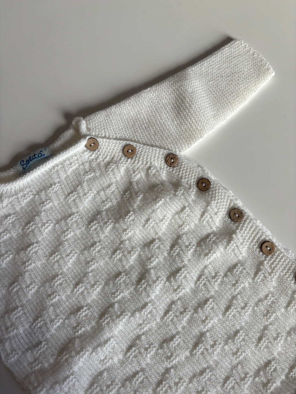 Pelele blanco abotonado