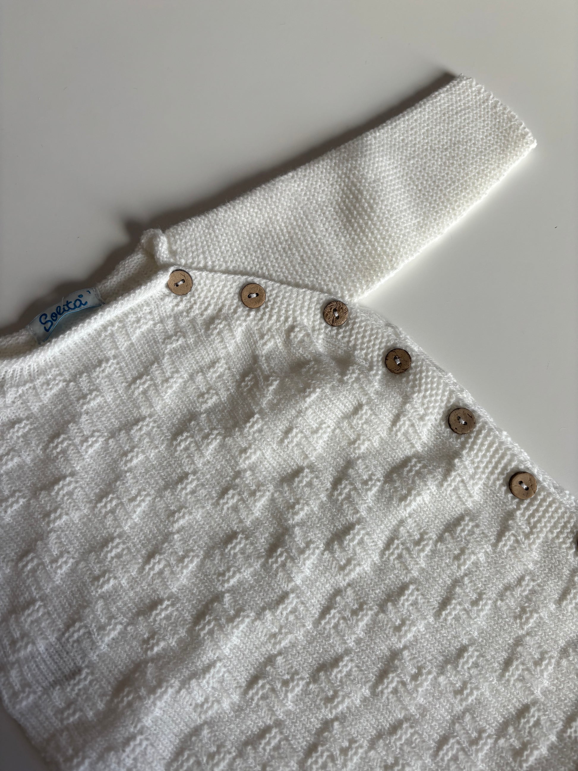 Pelele blanco abotonado