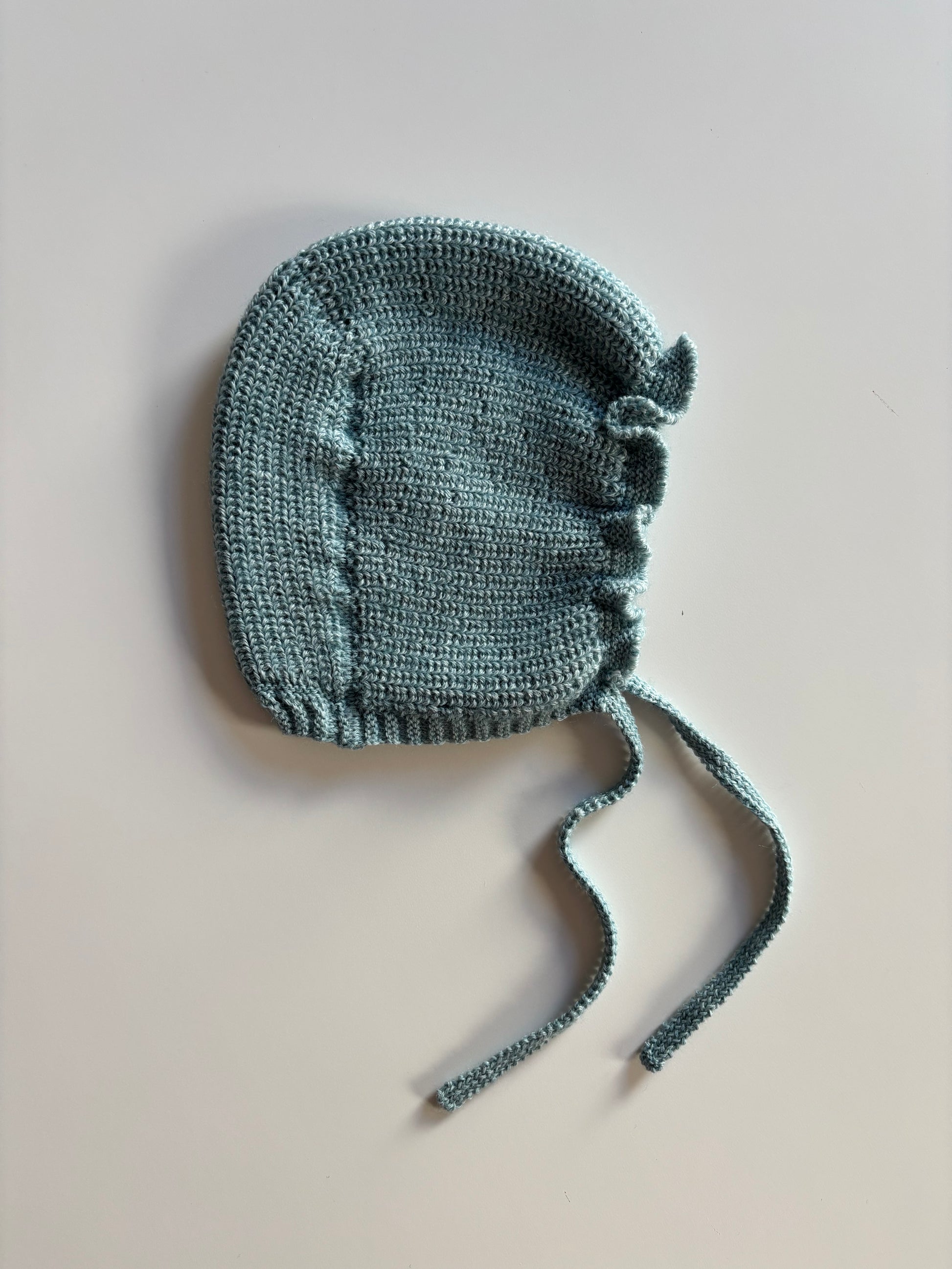 Capota de lana turquesa