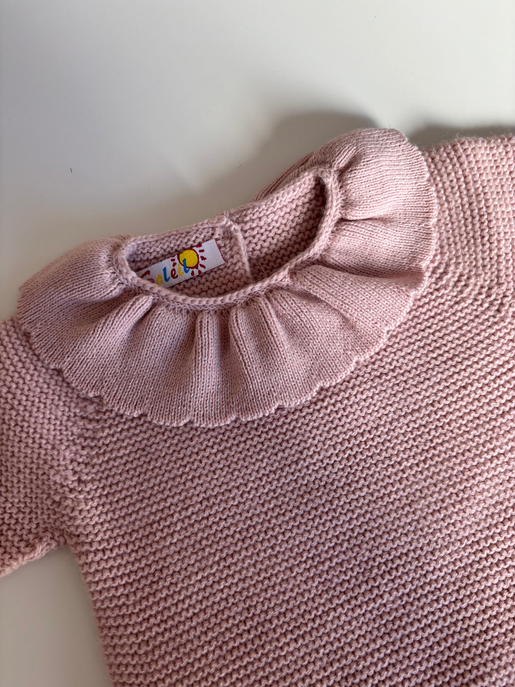 Pelele punto rosa detalle cuello