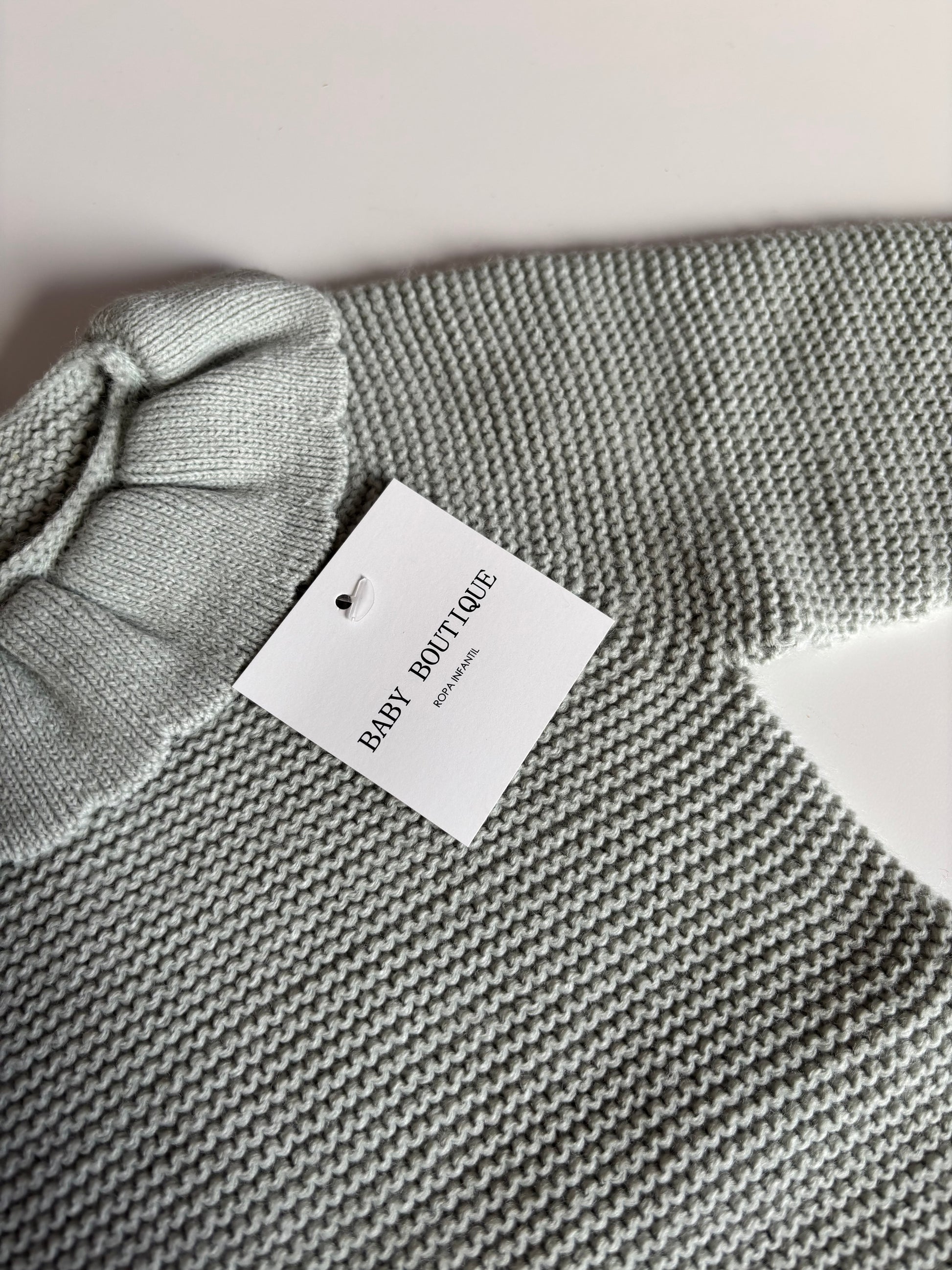 Pelele punto azul detalle cuello