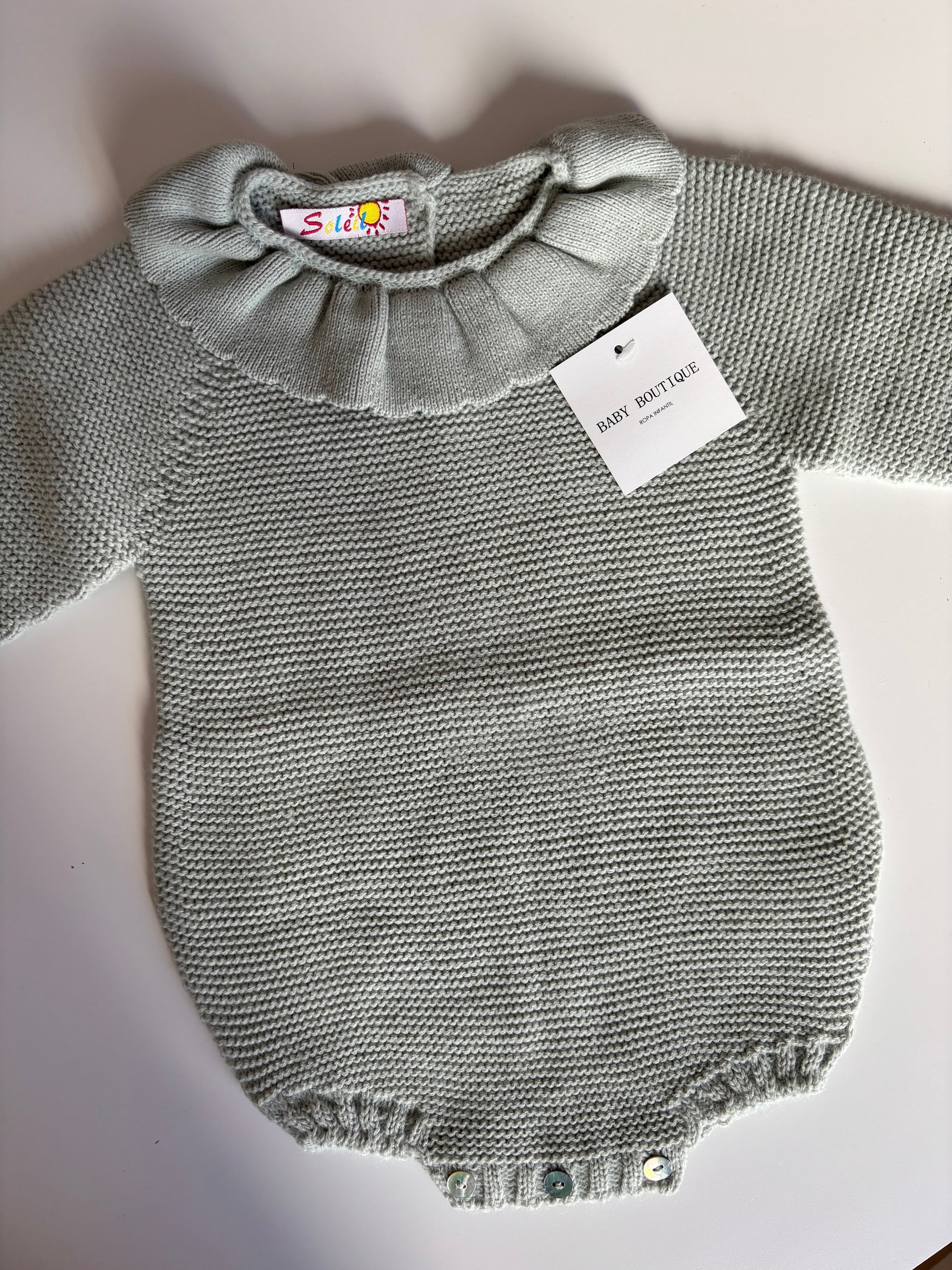 Pelele punto azul detalle cuello