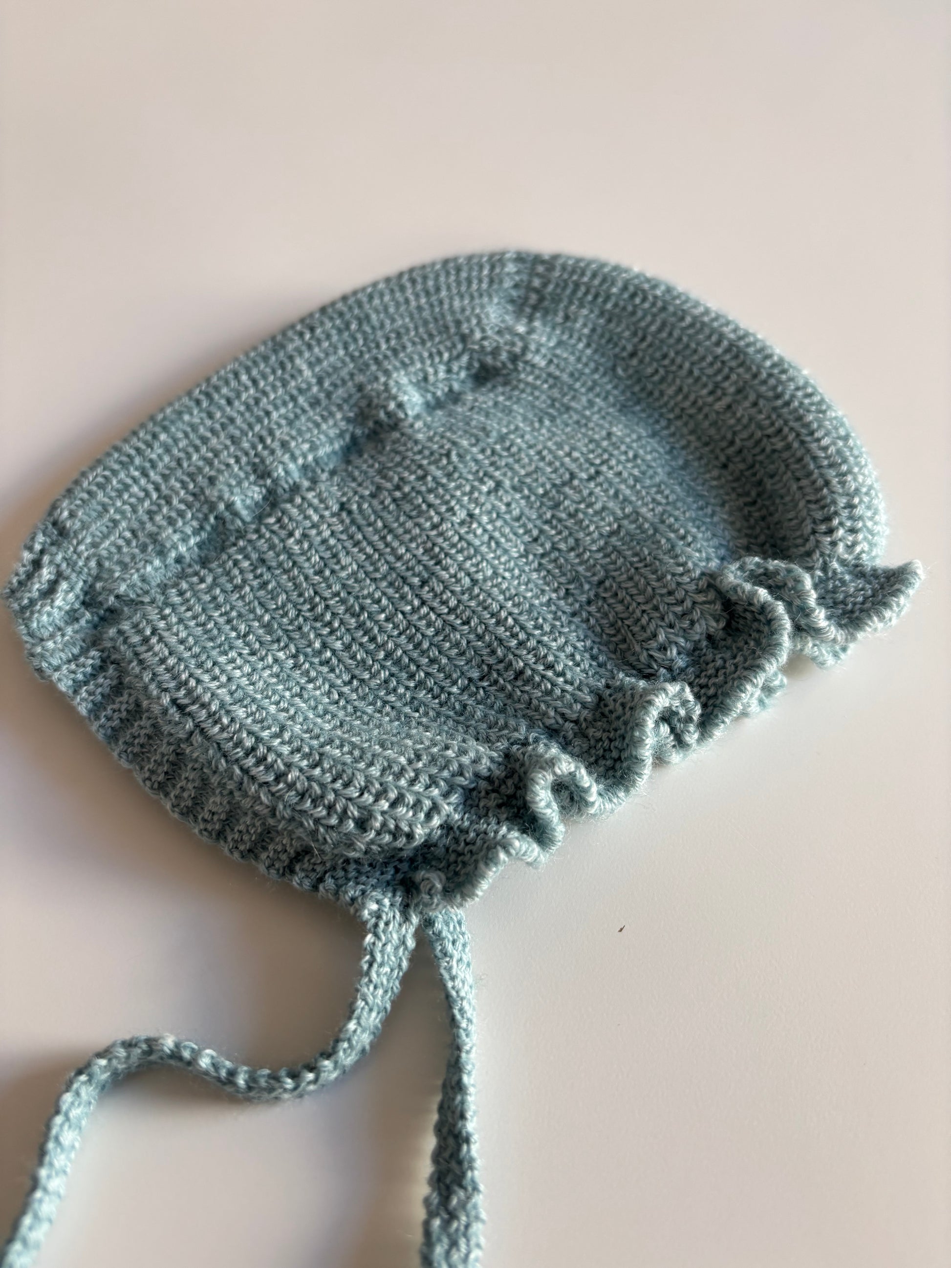 Capota de lana turquesa
