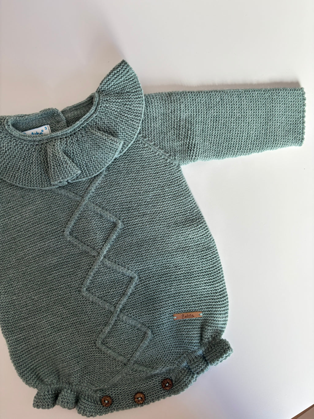 Pelele punto verde detalle cuello