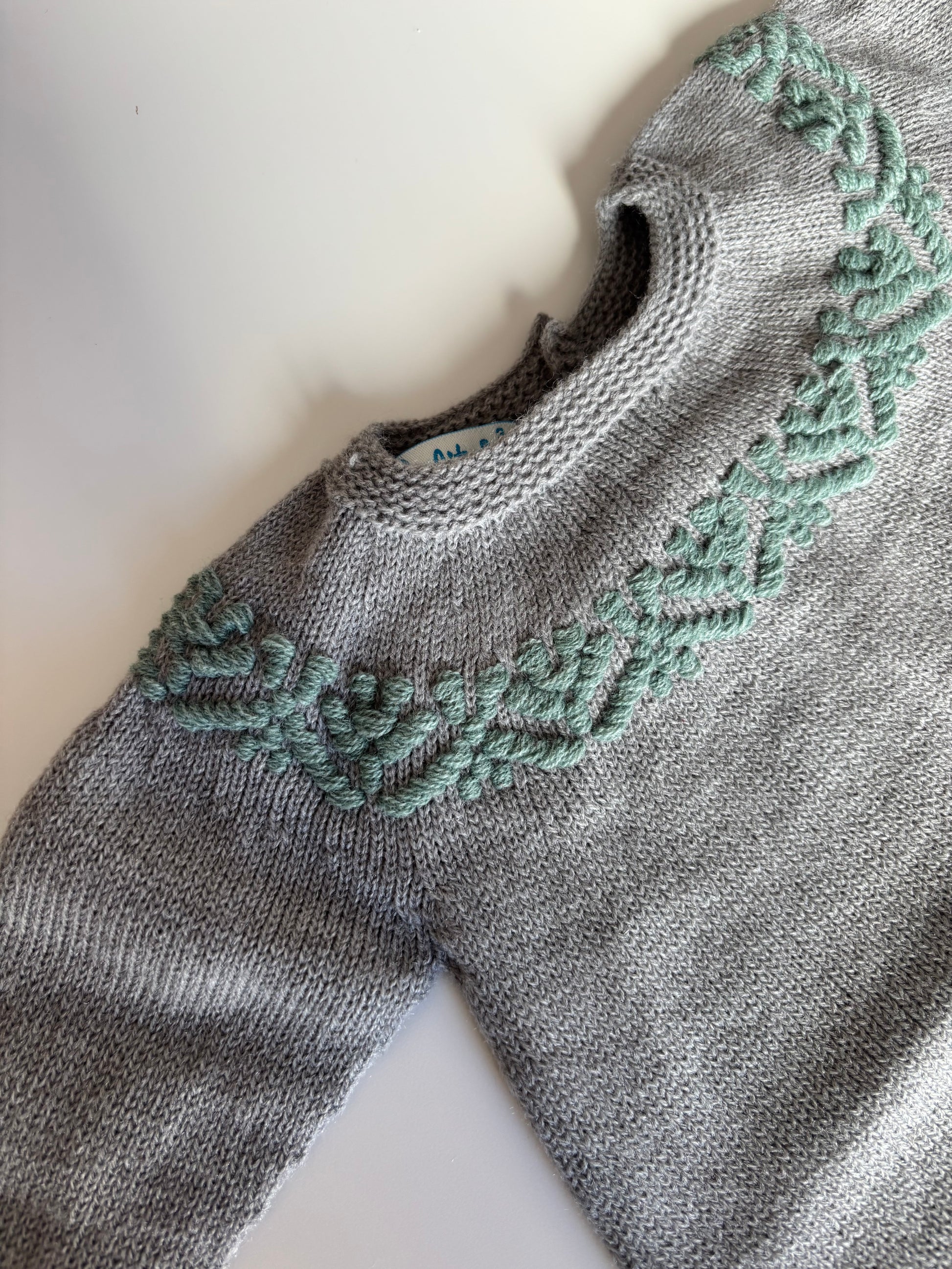 Pelele detalles verdes