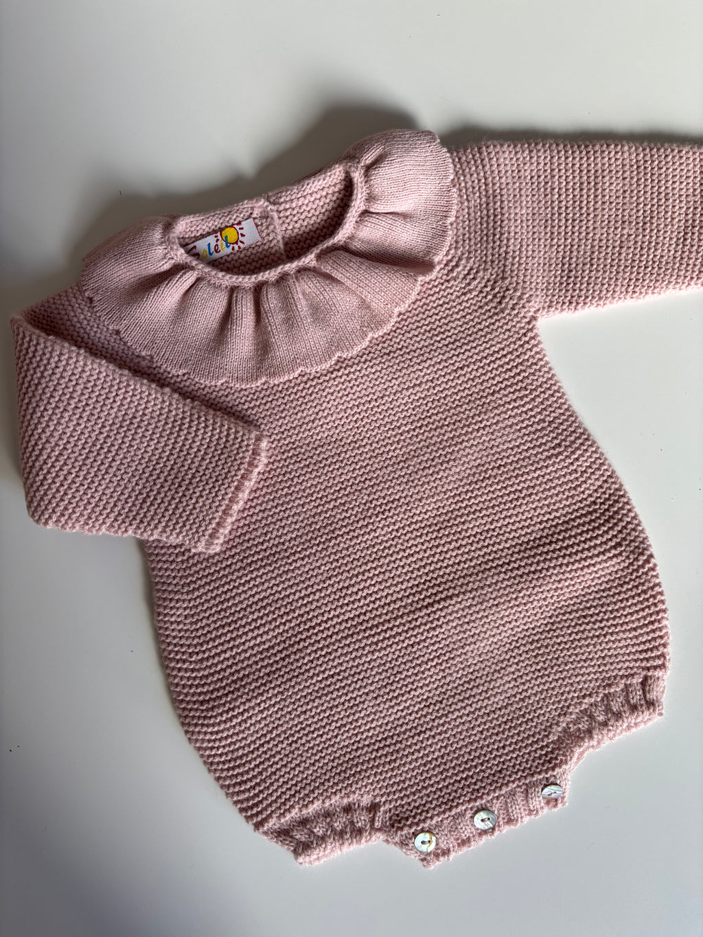 Pelele punto rosa detalle cuello