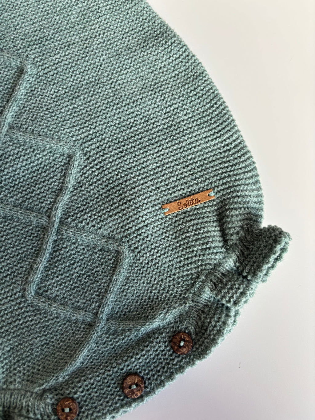 Pelele punto verde detalle cuello