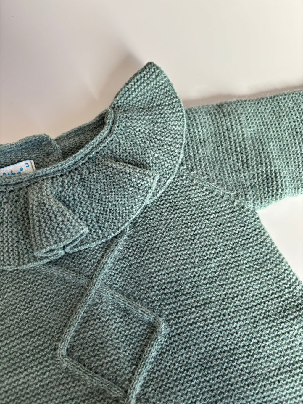 Pelele punto verde detalle cuello