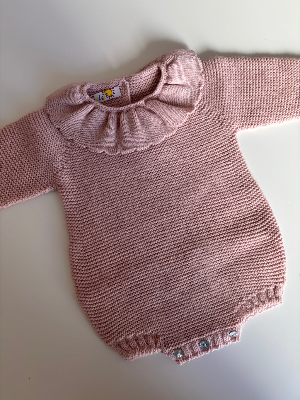 Pelele punto rosa detalle cuello