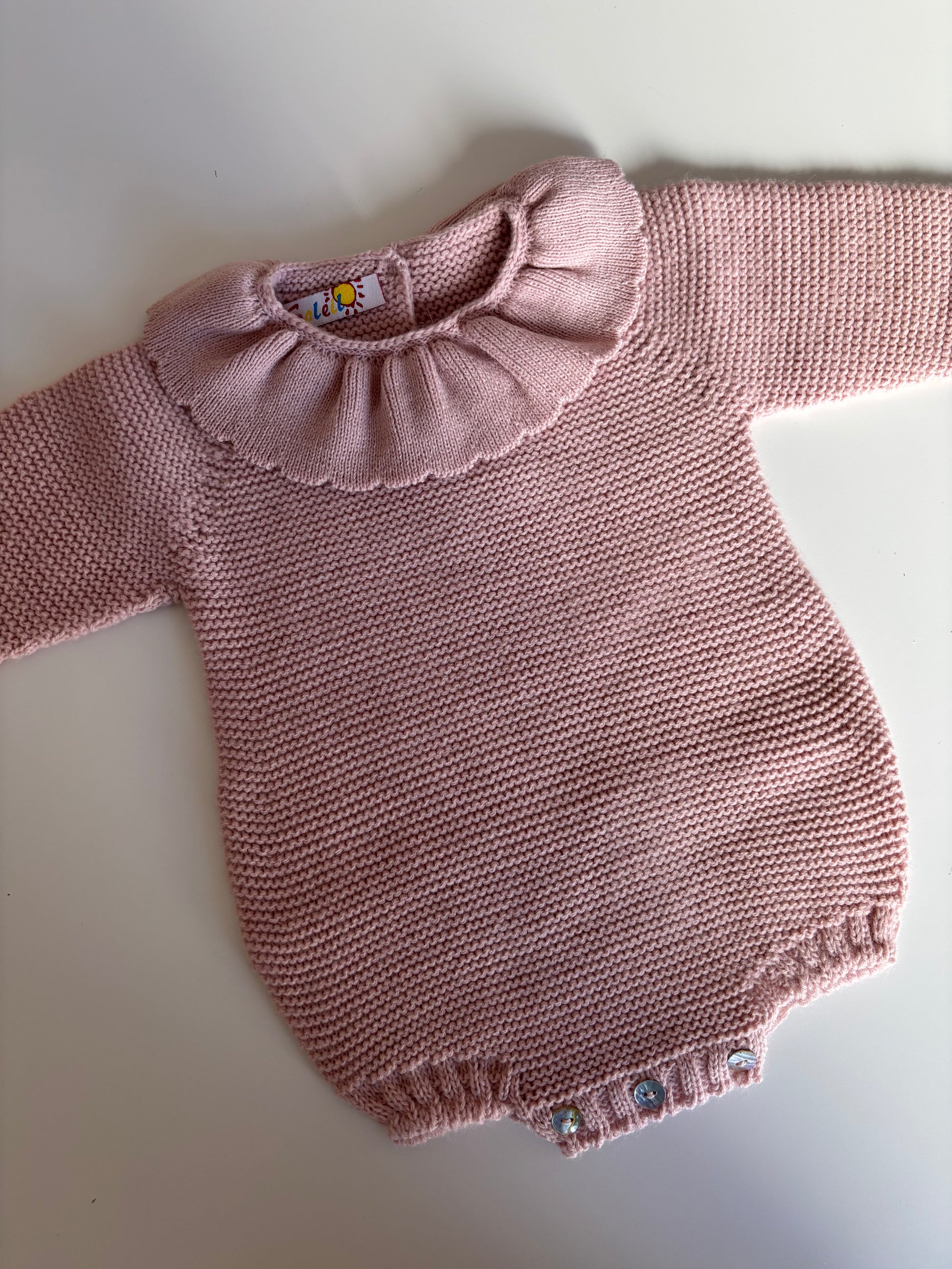 Pelele punto rosa detalle cuello