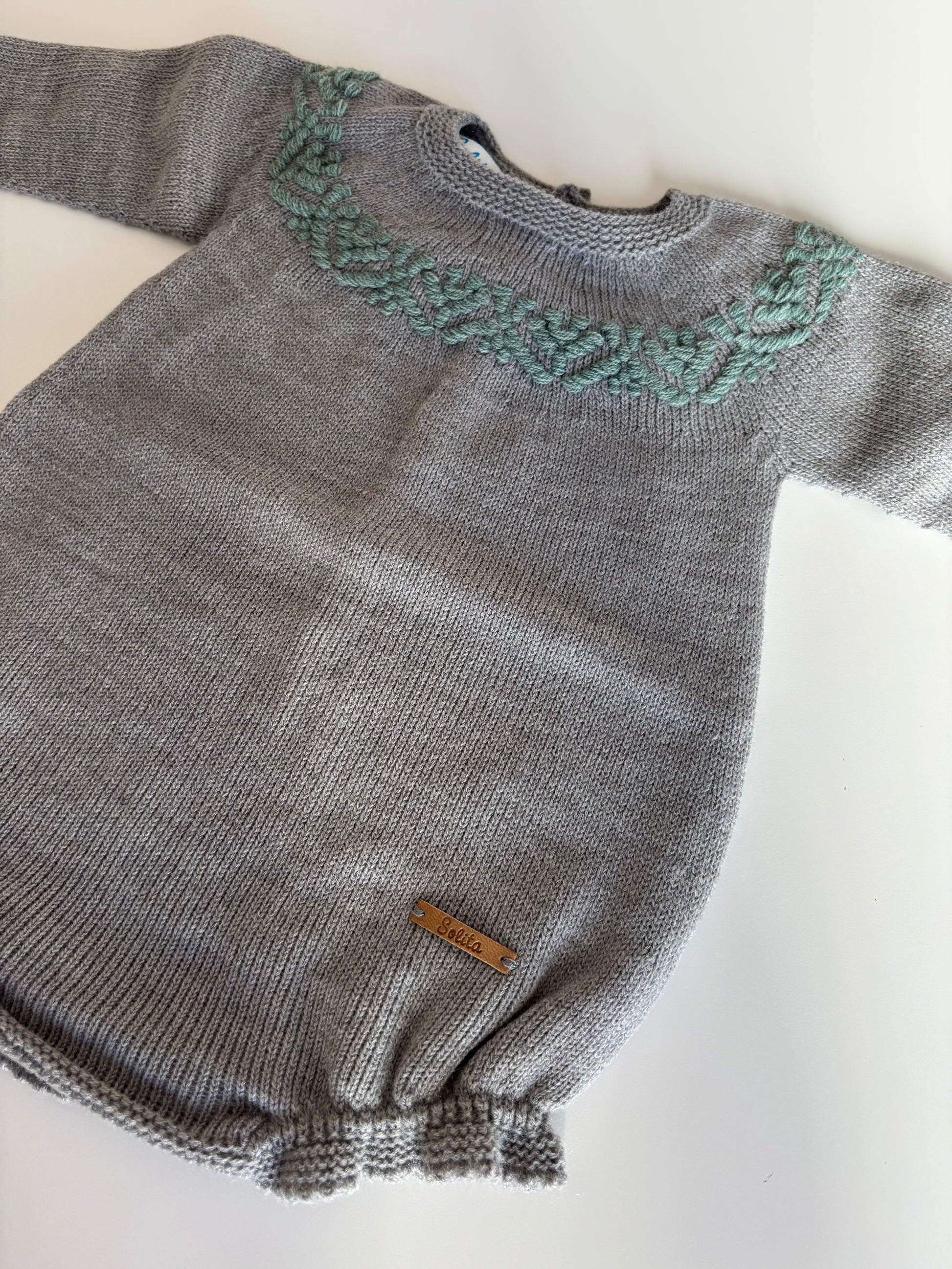 Pelele detalles verdes