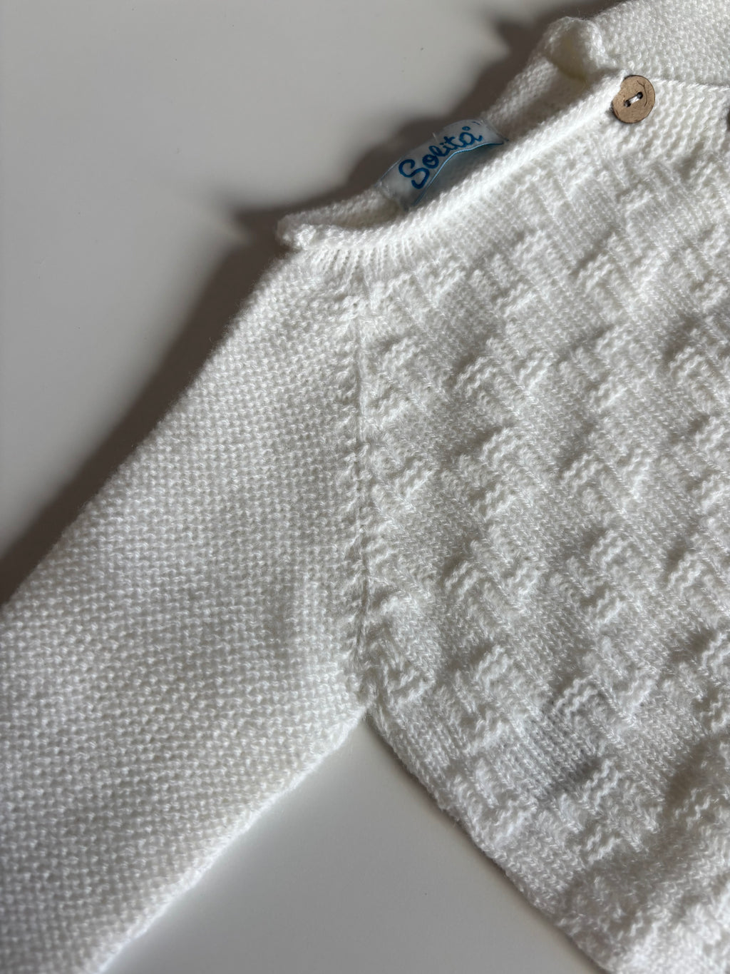 Pelele blanco abotonado