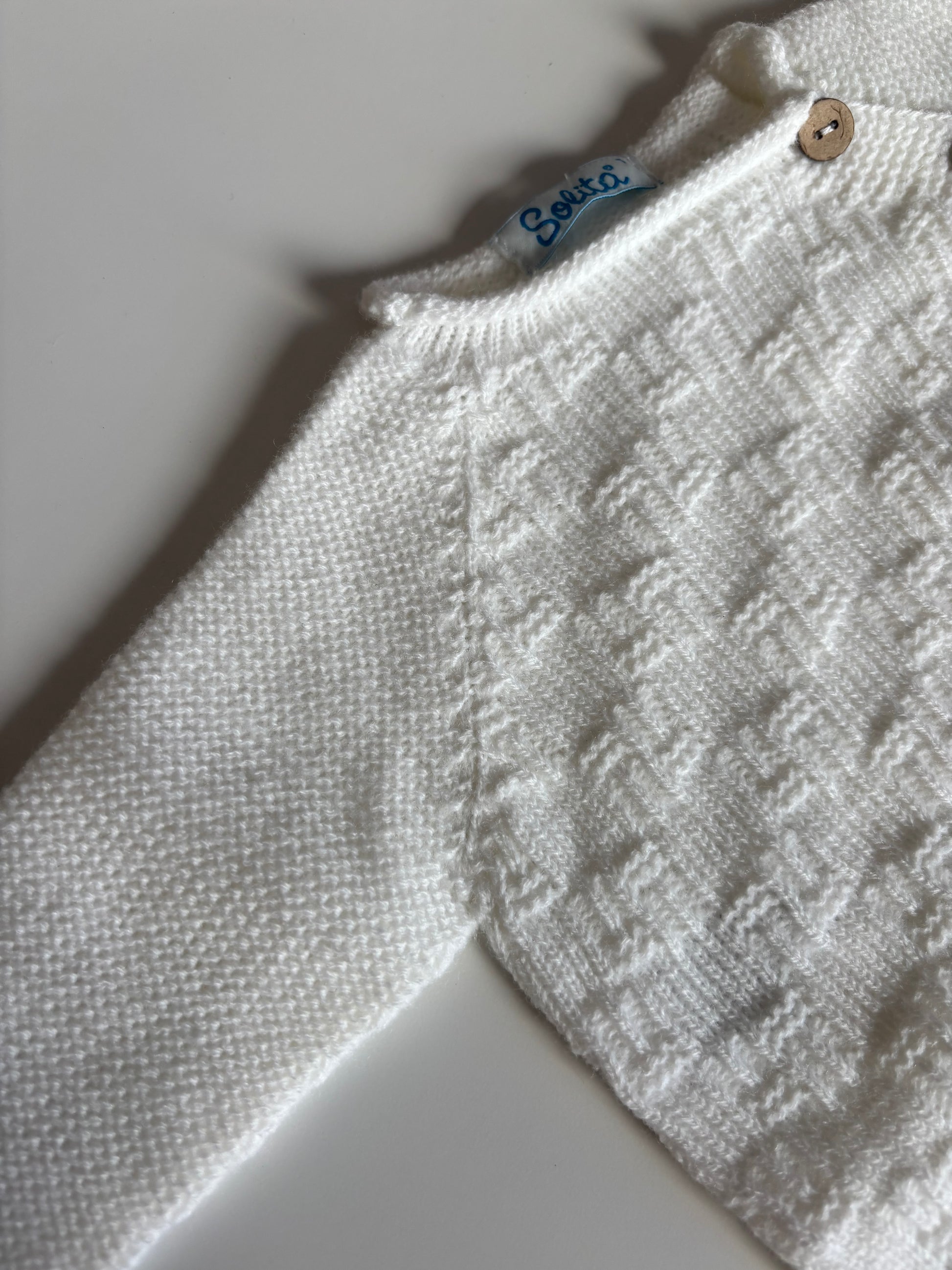 Pelele blanco abotonado
