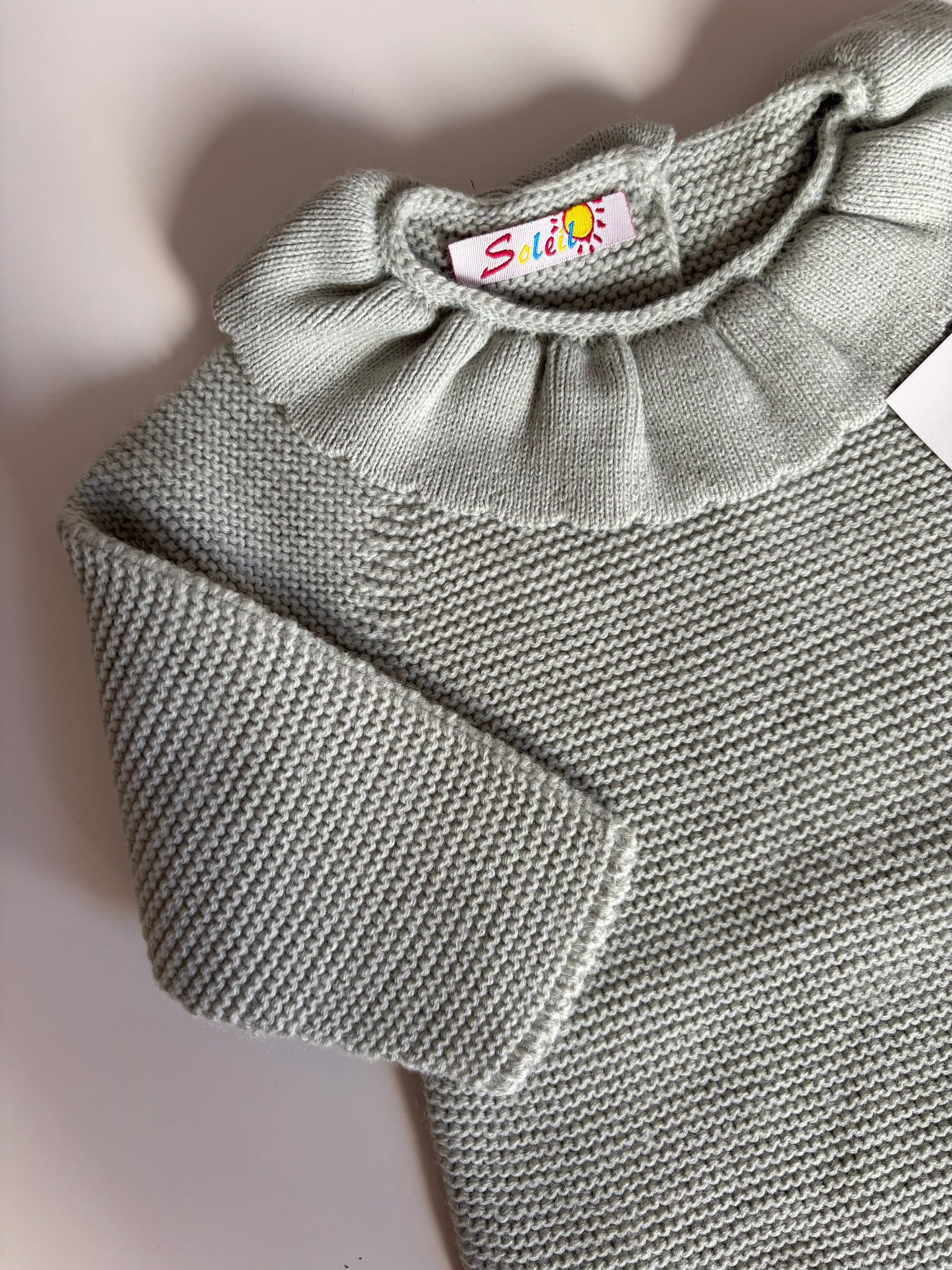 Pelele punto azul detalle cuello